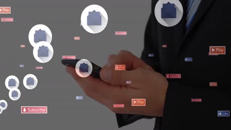 Animation-Von-Social-Media-Symbolen,-Die-über-Dem-Mittelteil-Eines-Geschäftsmannes-Schweben,-Der-Sein-Smartphone-Nutzt