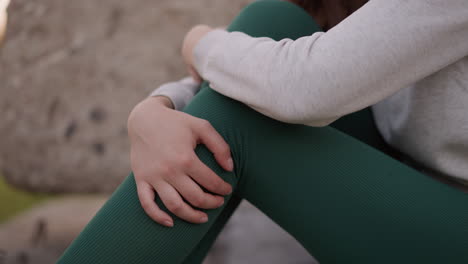 woman sitting with her legs crossed