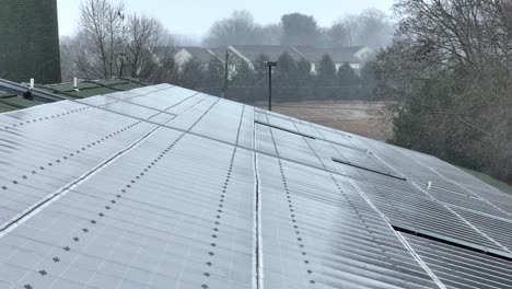 Aerial-rising-shot-of-solar-panels-on-a-rooftop