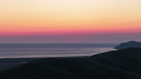 colorful sunset timelapse, sun disappear under adriatic sea horizon