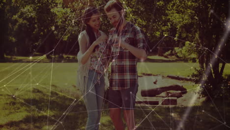 animation of network of connections over caucasian couple in love forming heart shape with hands