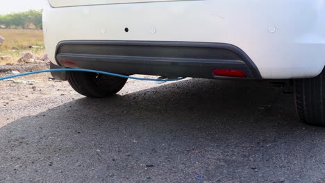 pollution checking of car under progress at national highway at day