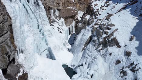 frozen waterfall in a mountain canyon