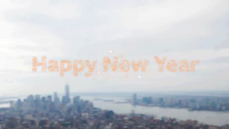 Happy-new-year-text-over-fireworks-exploding-against-aerial-view-of-cityscape