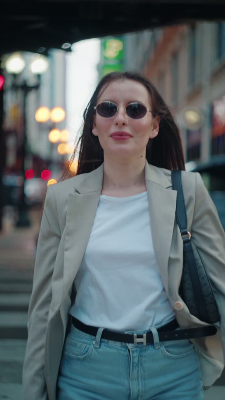 Confident Woman Enters and Exits Focus Walking in the City. Female empowerment concept, Chicago, Illinois USA