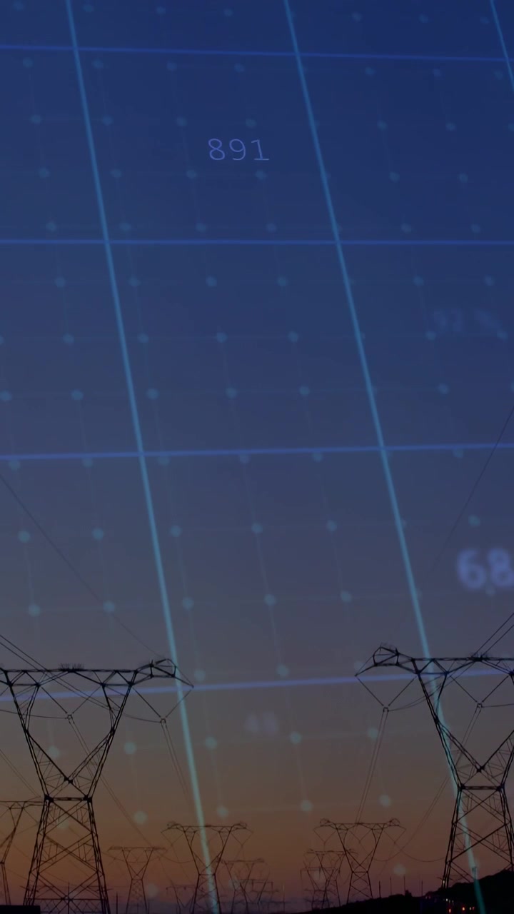 Vertical video: Digital grid updating from energy feed shifting numbers and monitoring power towers