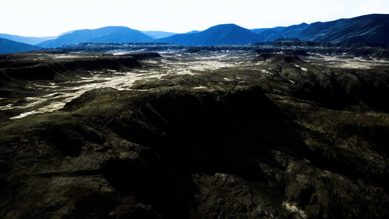 Vast mountains and a vibrant sky invite adventure and exploration