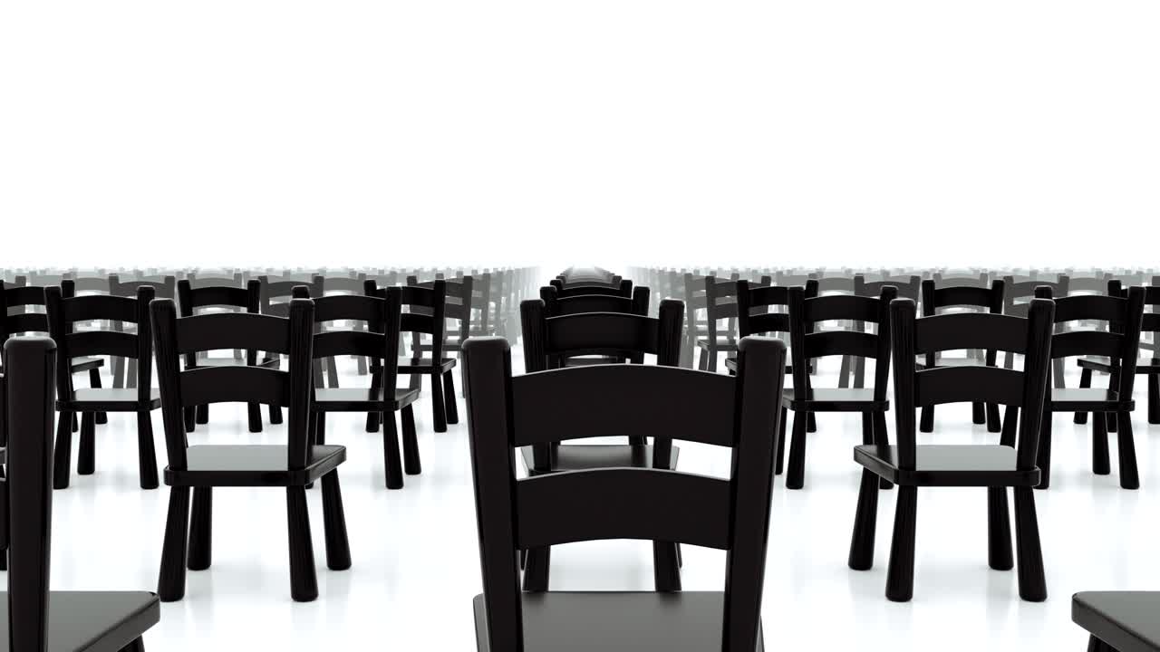 Black chairs set in rows.