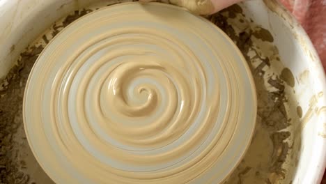 pottery on a potter's wheel