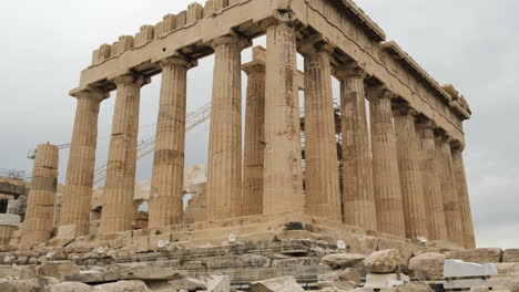 tilt up reveal parthenon temple ruins on the athenian acropolis, greece