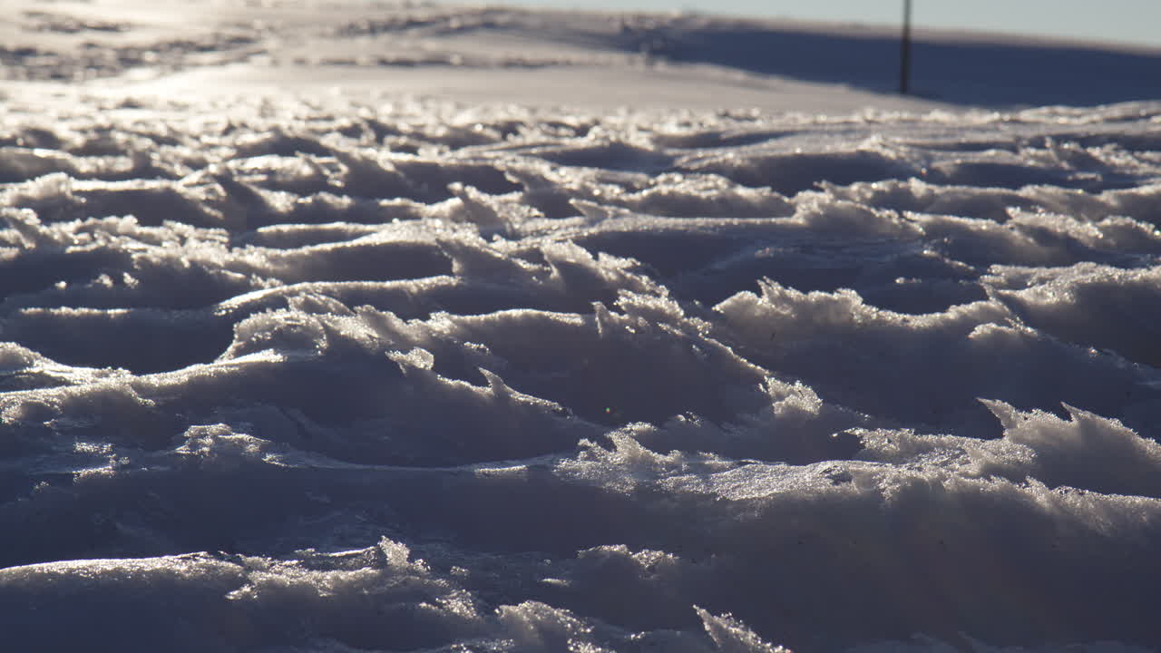 Texture Of Snow On Ground. Icy Winter At Bavarian Alps In Germany. closeup shot