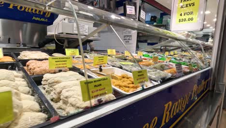 various meats and poultry on display