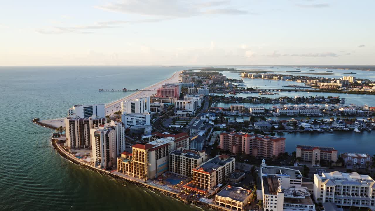 High-rise resorts overlook the sweeping sands of Clearwater Beach, with the Gulf of Mexico on one side and winding residential waterways on the other