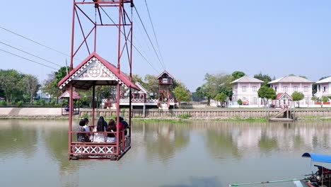 cable car transporting people across a river