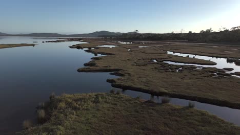 4k60 low flight drone view of moulting lagoon in tasmania australia