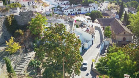 Camera-slowly-tilts-up-showing-the-beauty-of-the-famous-Spanish-district-in-Granada,-the-Sacromonte