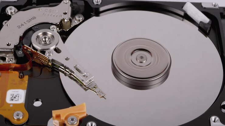 Hard Disk Drive Inside. Structure of HDD, Spinning Platter. Move magnetic head