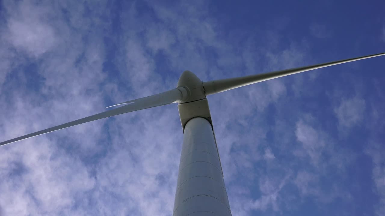 A wind turbine is a device that converts the wind's kinetic energy into electrical energy.