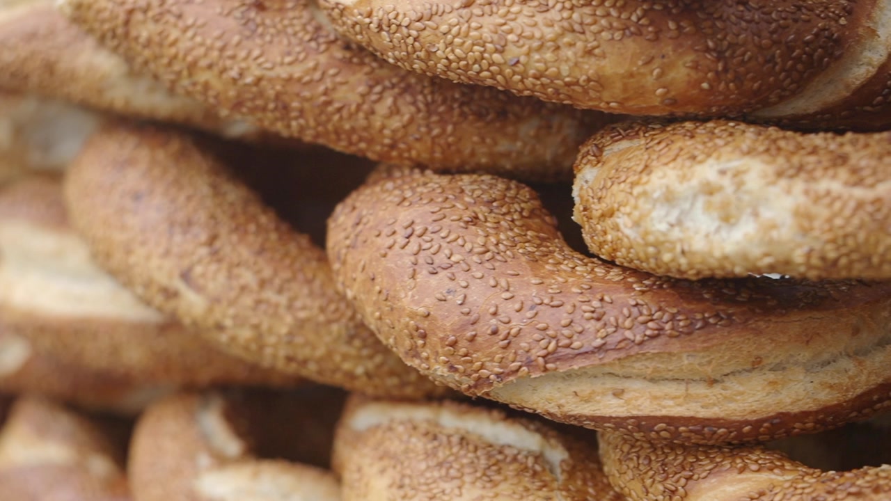 Close-up of Stacked Turkish Simit Bagels with Sesame Seeds