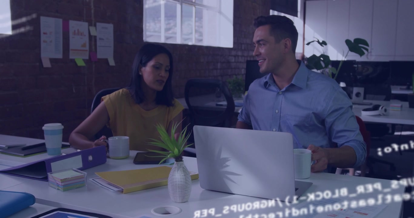 Business People Discussing Data and Technology in Modern Office
