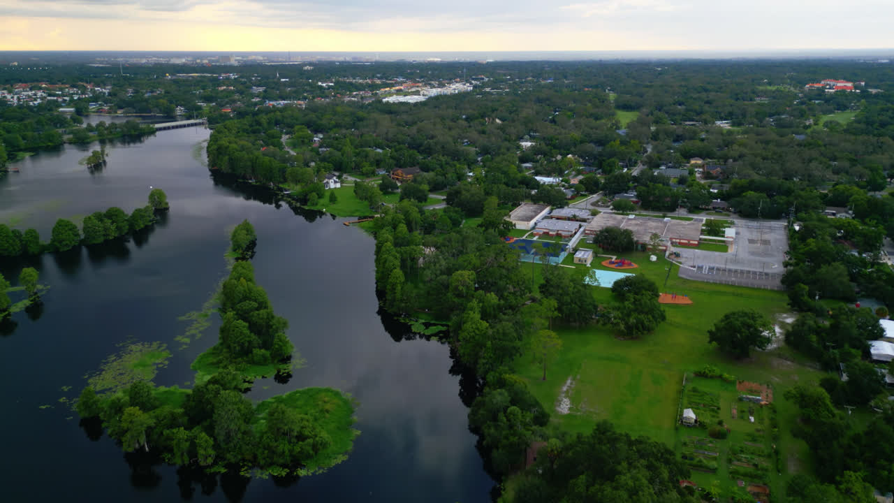 Riverhills Park And Riverhills Elementary Magnet School By Hillsborough River In Temple Terrace, Florida, USA. - aerial shot