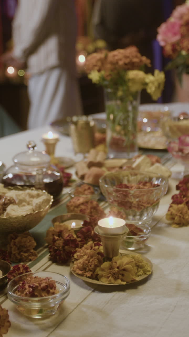 Elegant Table Setting with Flowers and Candles