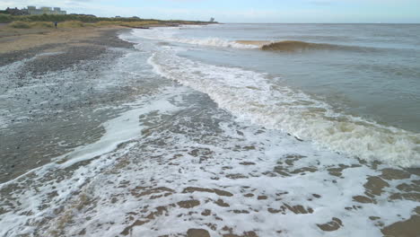 whitecaps breaking from murky irish sea