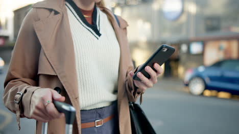 woman using smartphone in city