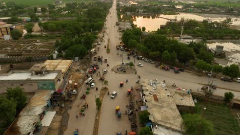 Aerial-View-Over-Traffic-Going-Around-Roundabout-In-Badin