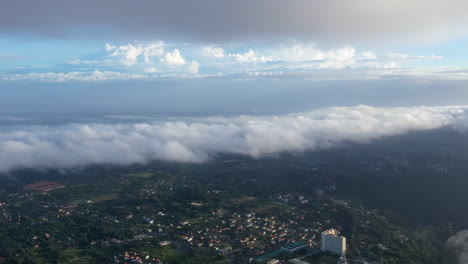 hyperlapse of clouds flying over the city of tagaytay, philippines