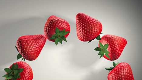3d animation of strawberries. fresh strawberries with green leaves on a white background. sweet fruits. the concept of a healthy lifestyle and nutrition in general. rotate the strawberries. shadow.