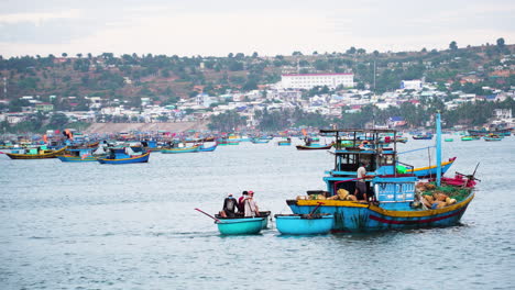 colorful vietnamese fishing boat sailing in harbor of mui ne fishing town