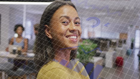 animation of data processing over biracial businesswoman working in office