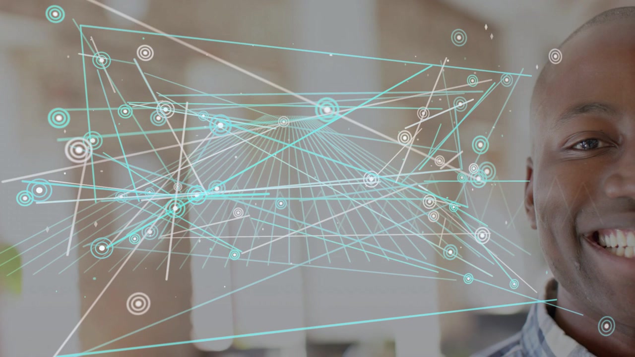 Tech feed starting, office man watching teal wire grid growing, nodes lighting, smiling for demo