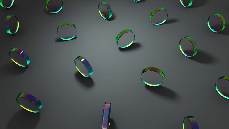 3D computer rendering of crystal glass round objects rotating on dark background. 4K seamless loop animation footage.