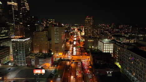 aerial flight above traffic at night