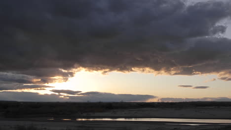 Zoom-out-time-lapse-of-clouds-and-sunset-at-Homolovi-Ruins-State-Park-near-Winslow-Arizona