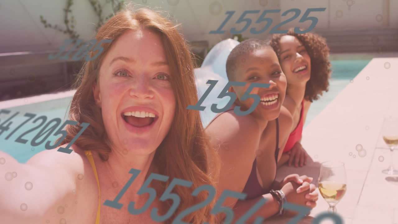 Animation of numbers overlaying scene with women relaxing poolside in swimwear