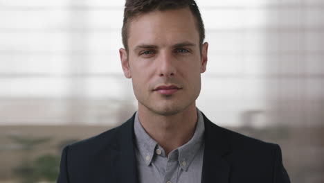 young handsome man portrait of successful business entrepreneur looking serious pensive at camera