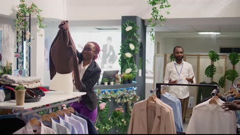 woman changing shop mannequin clothes