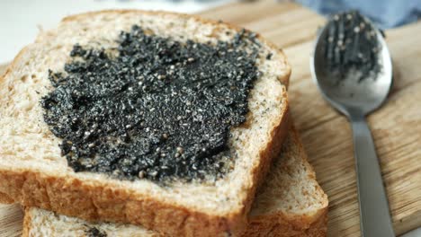 black sesame spread on a bread ,