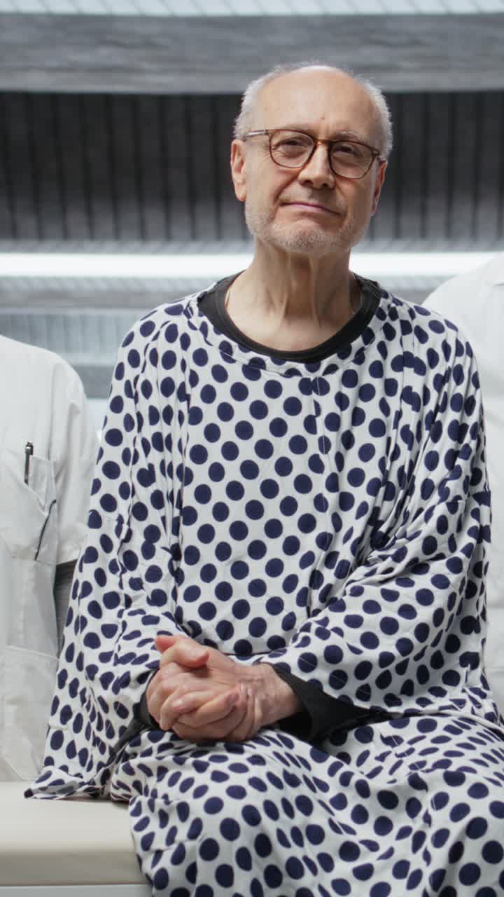 Vertical Video Portrait of patient and two experts sitting in modern research laboratory