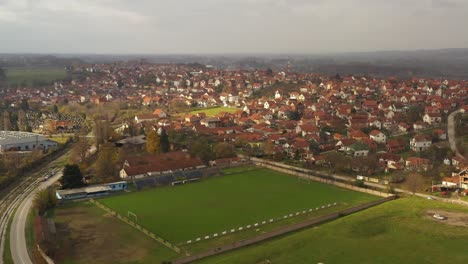 stadion fk metalac with residential houses - football field in kraljevo, serbia