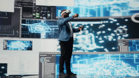 digital tech expert coding and using vr headset at innovation hub