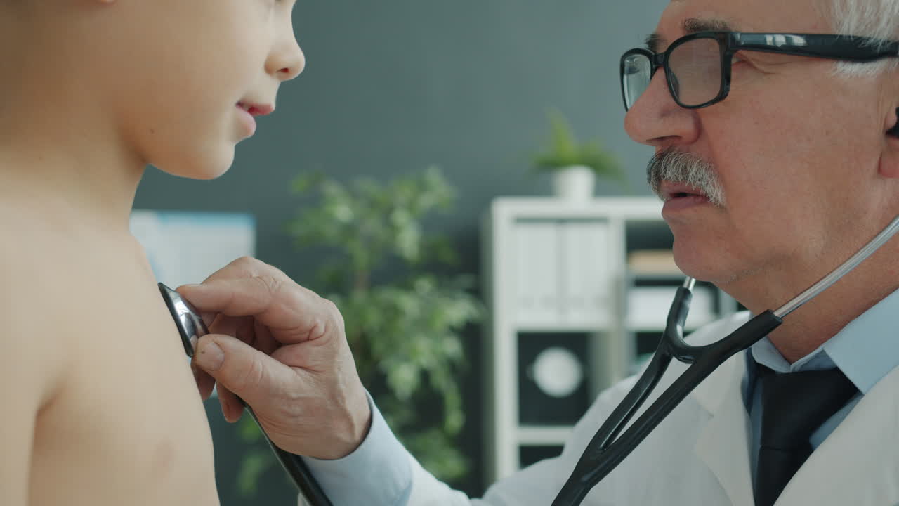Doctor Examining a Child's Heart and Lungs