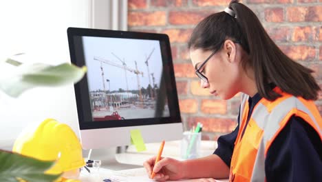 civil engineer woman working on computer