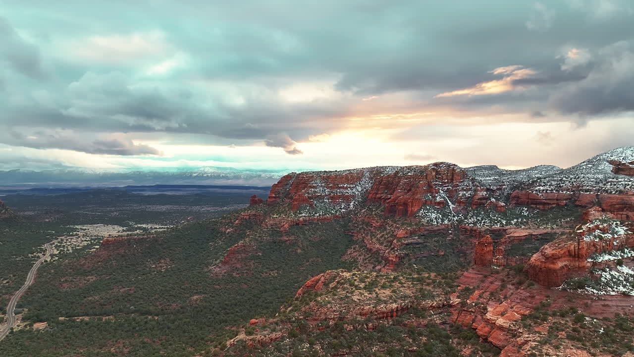 Red Sandstone Rocks With Snow In Sedona, Arizona - Aerial Drone Shot