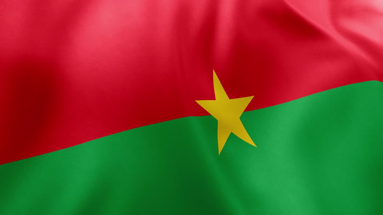 Realistic waving flag of Burkina Faso, red, green stripes, yellow star. West African nation symbol, Ouagadougou, patriotism, Burkina Faso