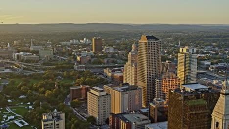 hartford connecticut aerial v10 drone fly around downtown capturing spectacular cityscape with shimmering sunset reflection on high rise glass windows - shot with inspire 2, x7 camera - october 2021