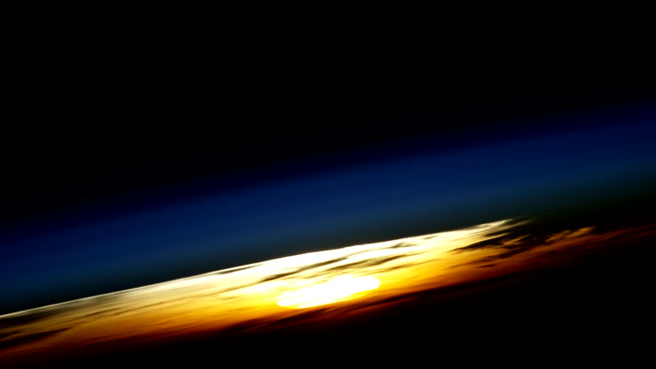Sunset above Earth seen from space. Nasa Public Domain Imagery